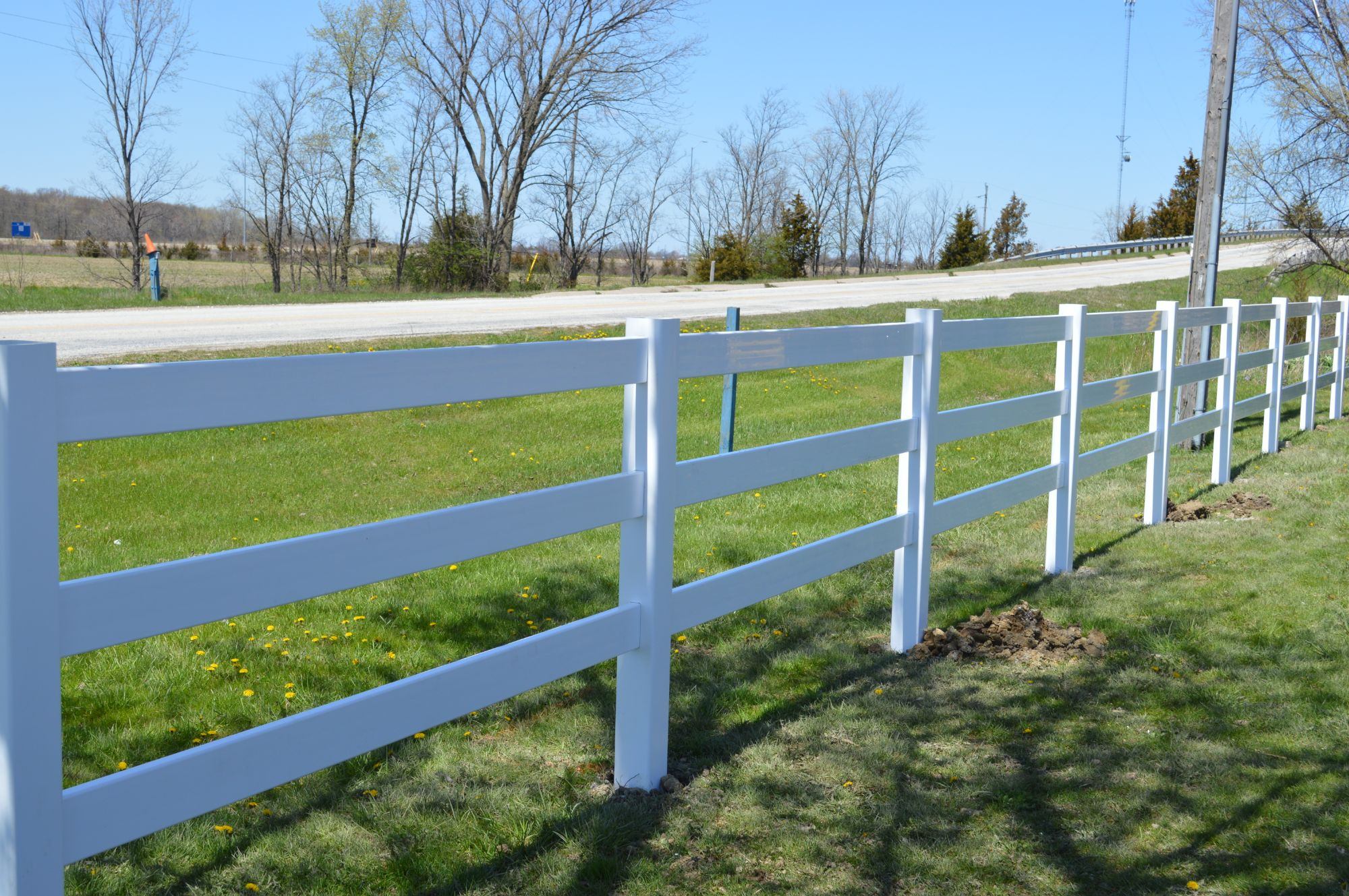 White - Post and rail vinly Fence